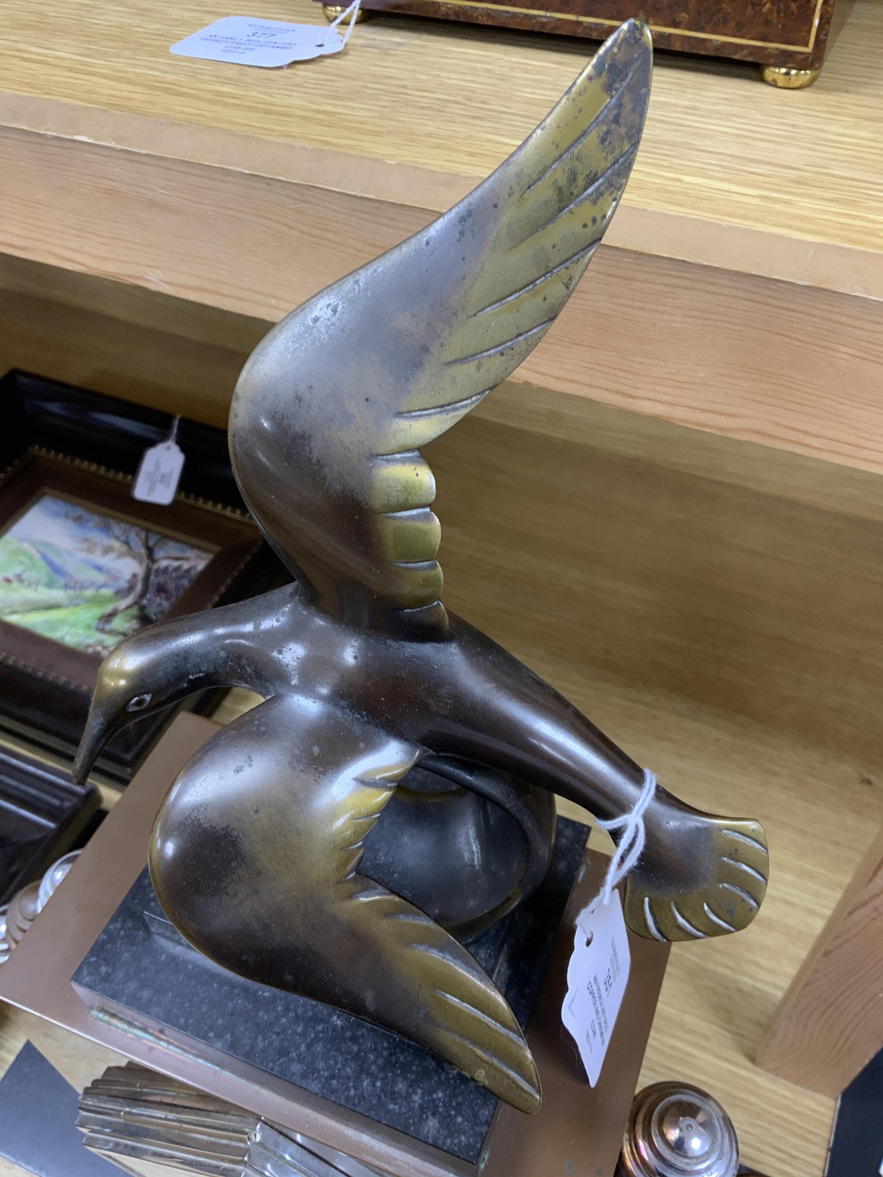 An Art Deco French copper mantel clock with bronze seagull surmount, 53cm